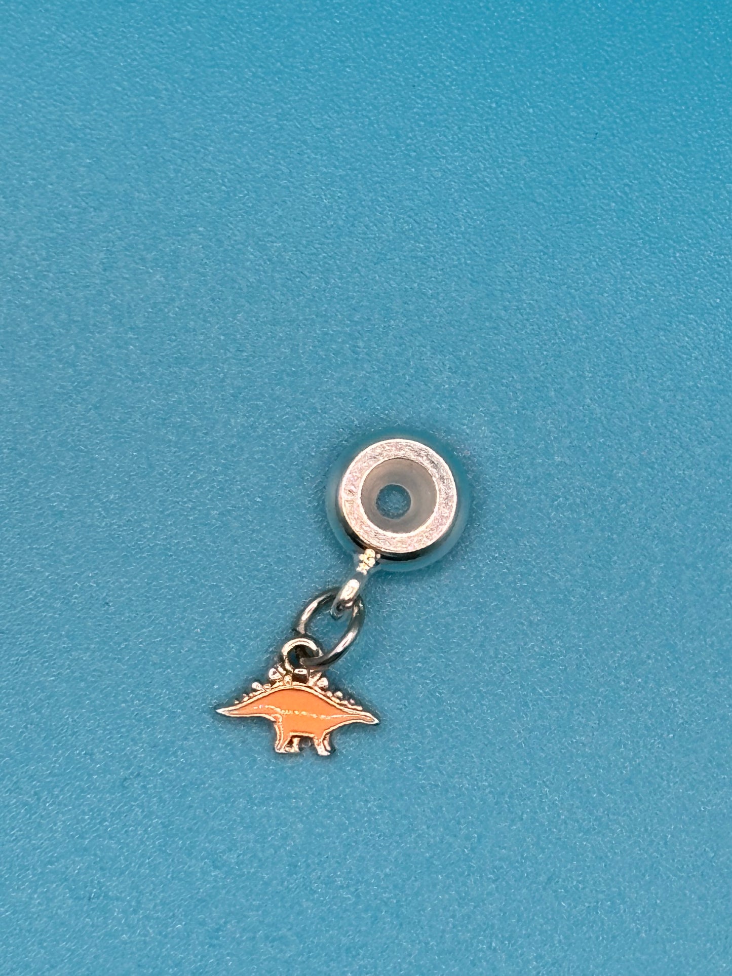 Orange Stegosaurus Charm￼